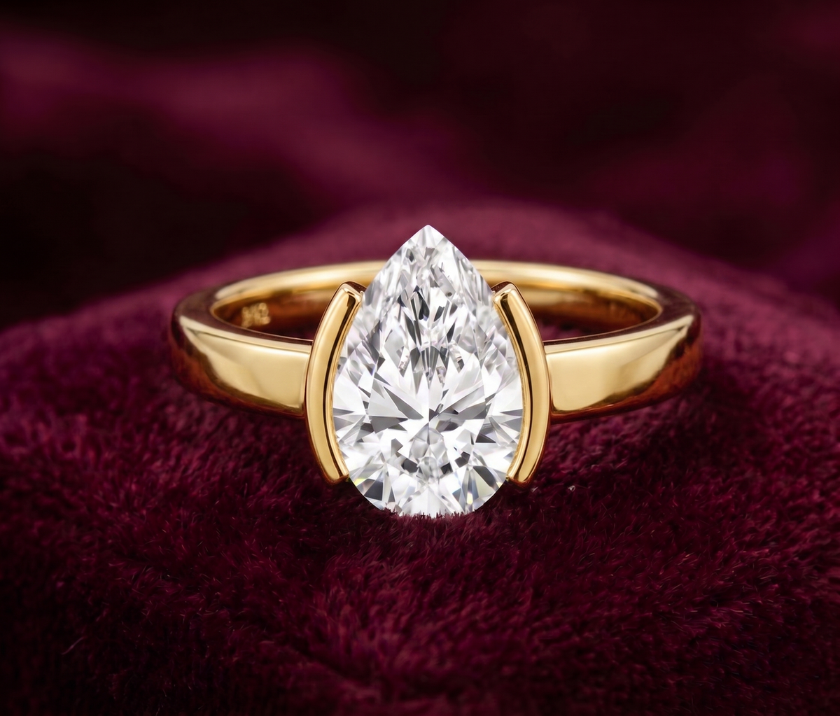 The Half-Bezel 2 Carat Pear Solitaire Ring