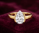 The Half-Bezel 2 Carat Pear Solitaire Ring